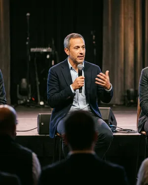 Daniel speaking on a conference panel